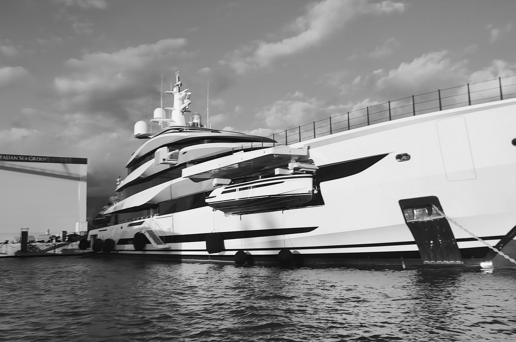 Superyacht alongside at the shipyard quay