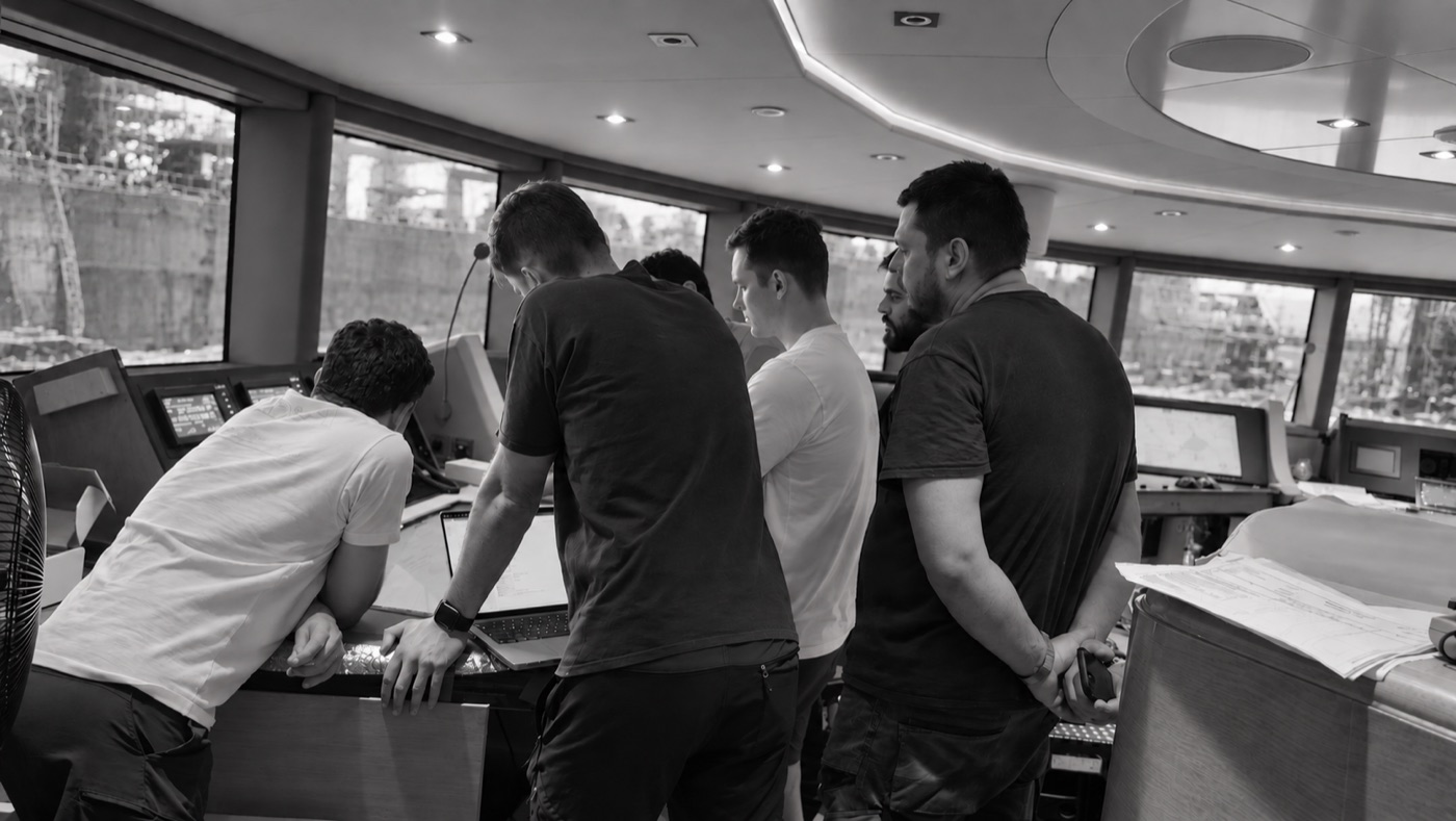 The engineering team at work on a superyacht bridge